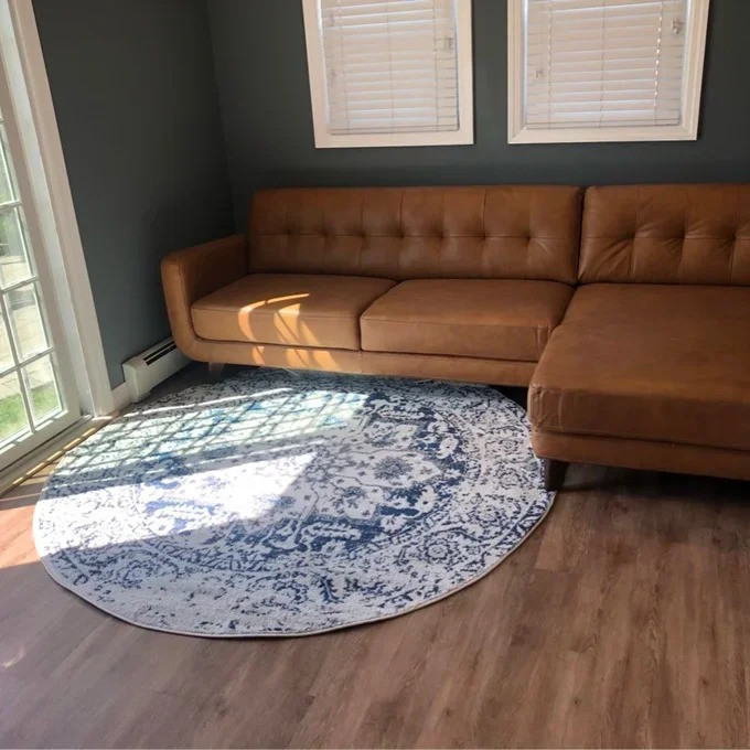 Casteel 111.5 Wide Genuine Leather Sofa & Chaise